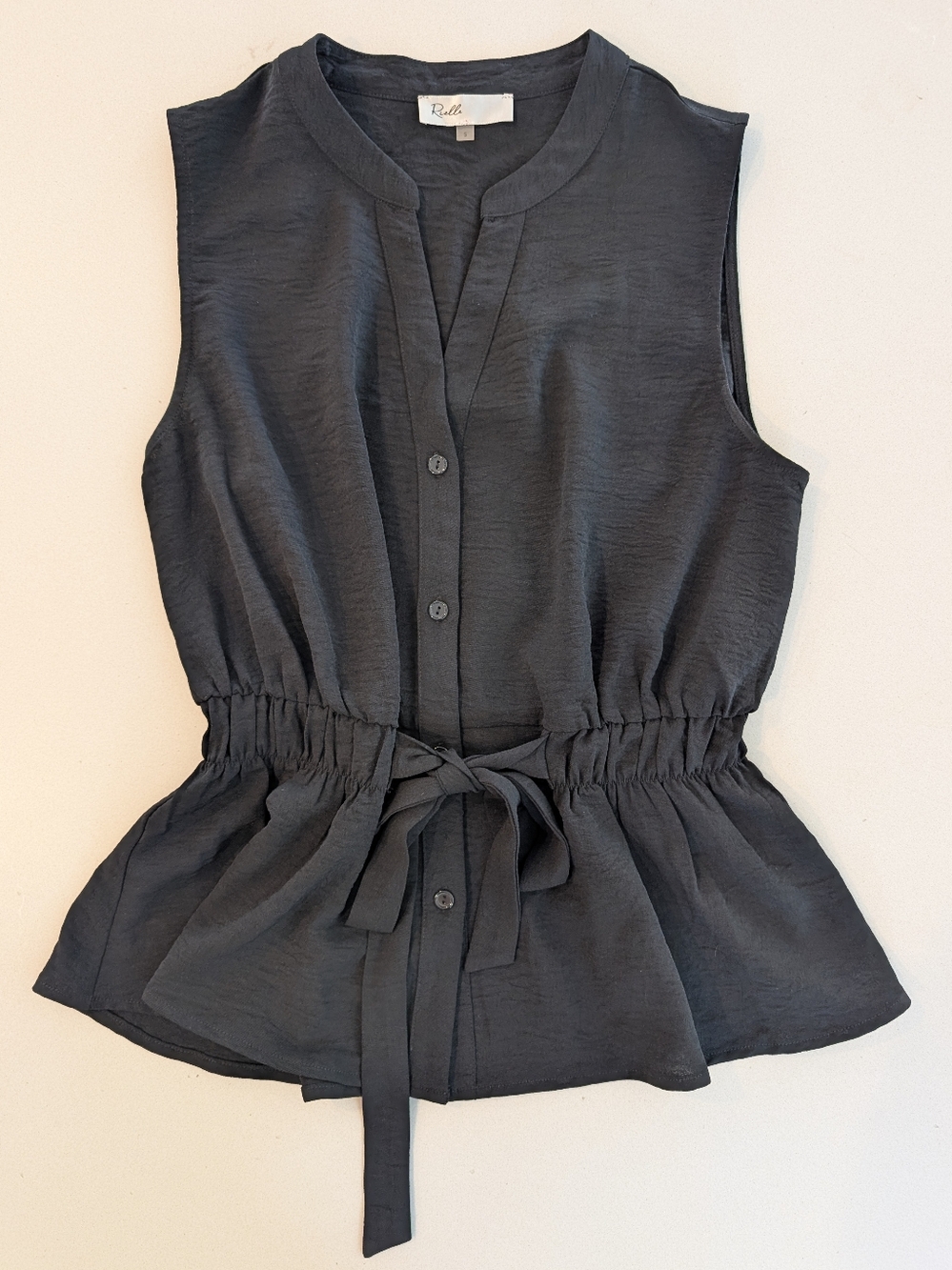 Ruell Sleeveless Button Front Peplum Blouse in Black Size Small